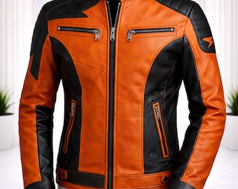 May include: A leather jacket featuring a vibrant orange and black color-blocked design. It includes a mandarin collar with a snap button, a central zipper closure, four zippered pockets on the front, and quilted shoulder panels.