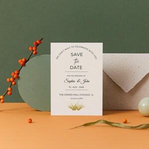 **Alt Text:**
Minimalist save the date wedding invitation card with matching envelope, styled on a modern pastel backdrop with decorative berries and elegant wedding stationery details, perfect for wedding announcement and bridal event planning.
