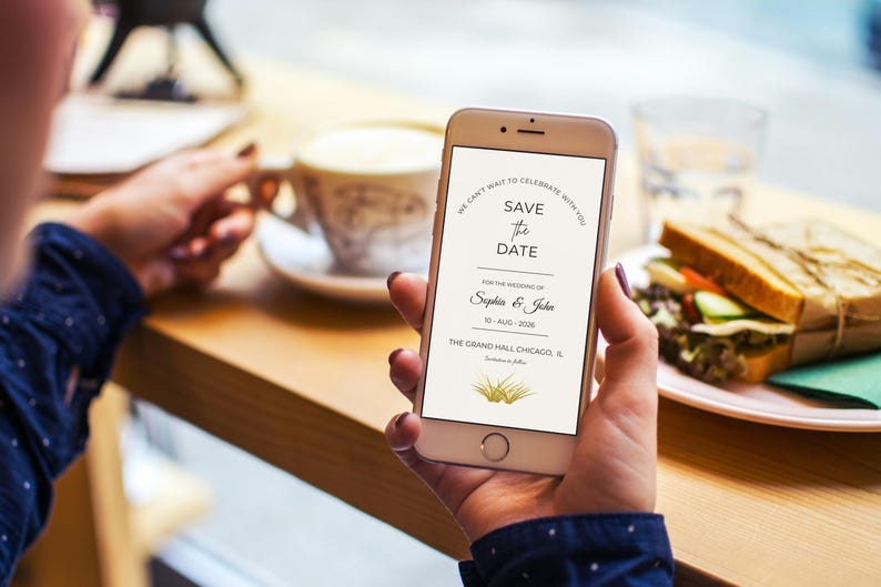 **Alt Text:**
Digital save the date wedding invitation displayed on a smartphone screen, showcasing a modern mobile wedding announcement template, electronic wedding invite, and elegant digital wedding stationery for online sharing.