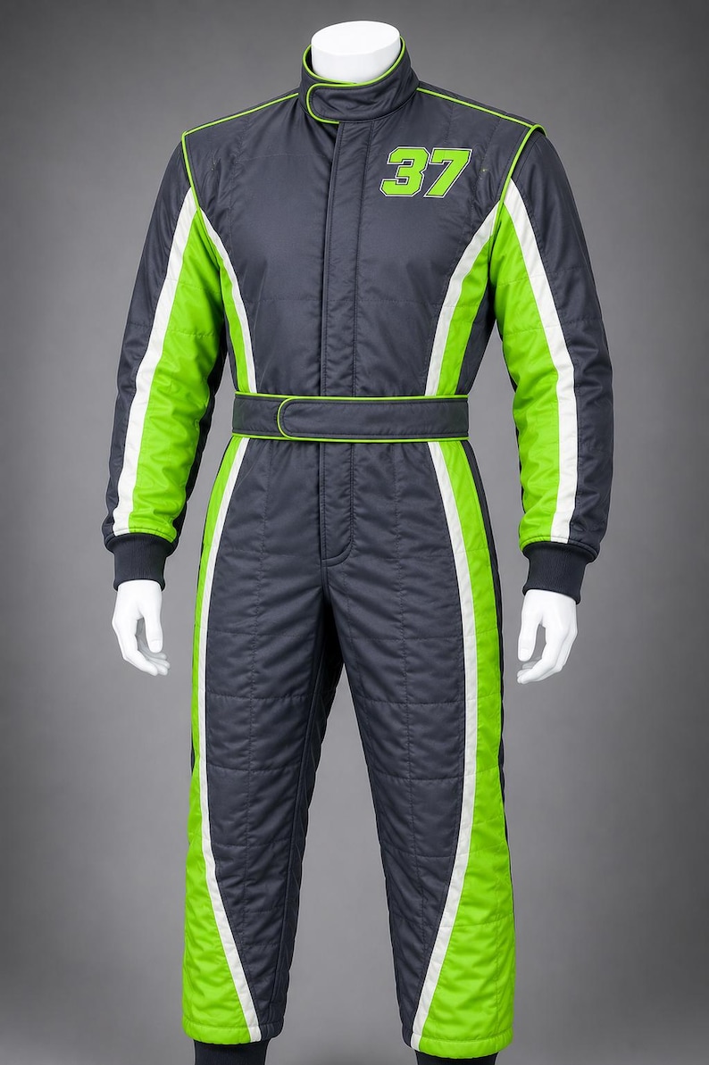 May include: A dark gray racing suit featuring bright lime green side panels with white piping accents. The suit includes a high collar with a hook-and-loop closure, a matching waist belt, and the number 37 printed in lime green on the chest.
