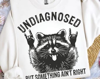 Undiagnostiziert, aber etwas stimmt nicht Waschbär PNG, lustiger digitaler Download, Rock auf Tiergrafik, schrulliges T-Shirt-Design