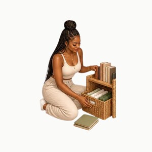 May include: A light brown woven wicker storage unit with a top shelf holding six upright books and a bottom drawer containing folded textiles. A separate light green rectangular item rests on the floor in front of the storage unit.