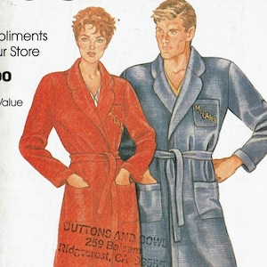 May include: Two robes, one red and one blue, with a white collar and a belt. The robes have the text "M-CALIS" embroidered on the front.