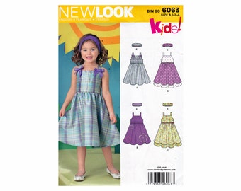 Toddlers Dresses and headband Sewing Pattern UNCUT OOP  Little girls toddler dress hair band New Look 6063 Kids! Pattern Sizes 1/2 1 2 3 4