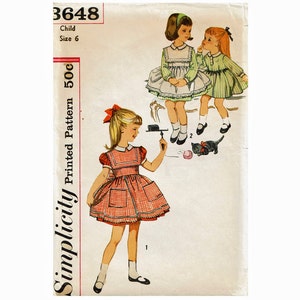 60s Dress and Pinafore Girls Size 6 Sewing Pattern Simplicity 3648 1960s Pinny Apron and full skirt dress