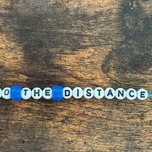 Geh zur Distanz Armband