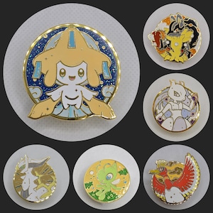 May include: A collection of six round enamel pins featuring various cartoon characters. The pins have gold-colored borders and depict characters in vibrant colors. The central pin showcases a character with a yellow head and white body against a blue background.