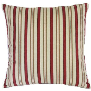 May include: A red and cream striped throw pillow with a square shape.