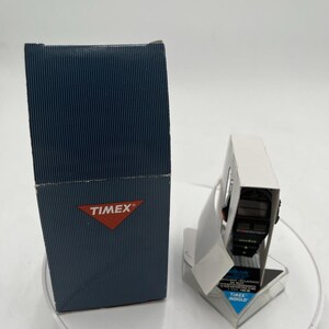 May include: A white ceramic mug with a black handle and the text "But First, Coffee" in a handwritten style. The mug is likely 11-15 ounces, perfect for a morning beverage. Ideal for coffee or tea lovers.