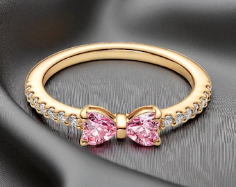 Funkelnder rosa Schleifenring, niedlicher Goldschmuck, eleganter zierlicher Goldring, stilvolles minimalistisches Accessoire für den Alltag