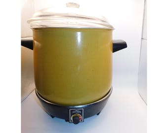 Olla de cocción lenta eléctrica Vintage West Bend Lazy Day de 6 cuartos, color naranja y marrón.