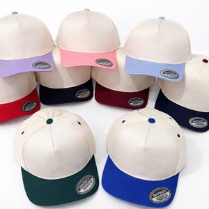 Tvåfärgad truckerkeps i canvas: Snapback i vintagestil