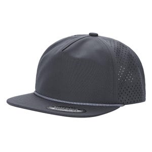 May include: A dark grey snapback cap featuring a five-panel construction with laser-cut ventilation holes on the side panels. The hat includes a decorative braided cord across the base of the crown and a flat brim with a circular sticker.