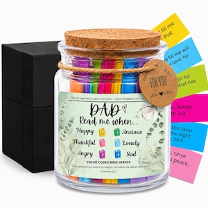 May include: A glass jar with a cork lid, filled with colorful Bible verses. The jar has a label that reads "DAD Read me when..." and includes prompts for different emotions. A gift tag says "FOR YOU."