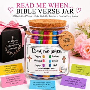 May include: A glass jar filled with colorful Bible verses, labeled "Read Me When... Bible Verse Jar." Includes a gift box with a pink ribbon and cards with Bible verses. The jar has a cork lid and a "For You" tag.
