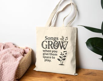 Las canciones crecen cuando les das espacio para jugar Bolsa de tela / Ilustración de planta musical