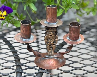 Vintage artisan-made copper candelabra with pre-Columbian design