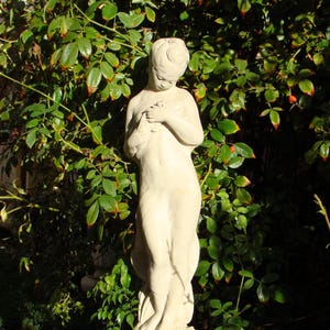 GIRL HOLDING DOVE (4 Color Options): Durable Solid Stone Statue. Tall Elegant Female Garden Decor. Sealed for Outdoor Use. Handcrafted U.S.A