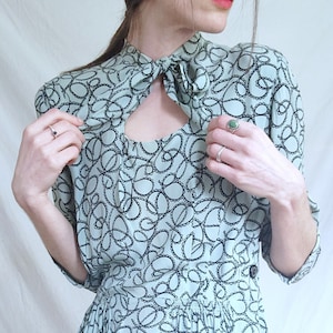 1930s 1940s Rayon Novelty Print Vintage Dress: Tie Neck, Celluloid Buttons, McKettrick Classics