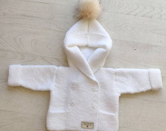 Brand new hand knitted baby hoodie.