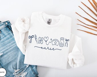 Cute Nurse Sweatshirt Medical Symbols Pullover Stethoscope Heart Bandage Graphic Top Nursing Student Gift Cozy Casual Nurse Sweater