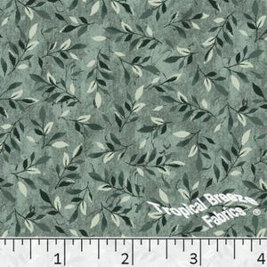 Tissu poly coton vert sauge avec des feuilles