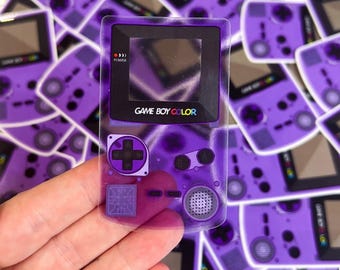 Lila Game Boy Genomskinlig | Nintendo Retro 90-tal | Vattentät vinylklistermärke