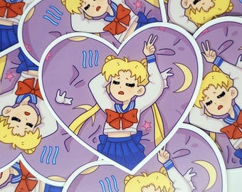 May include: A collection of heart-shaped stickers featuring a cartoon character with blonde hair, a blue sailor uniform, and a red bow. The character is set against a purple background with a crescent moon and stars.