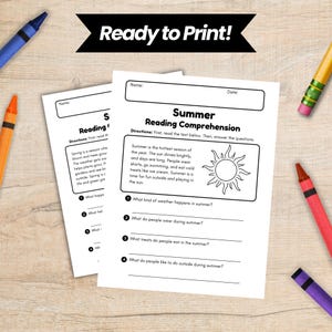 May include: Two white worksheets with the text "Summer Reading Comprehension" and "Reading Comprehension" are displayed. The worksheets have questions about summer. Crayons in blue, orange, red, and purple are scattered around the worksheets.