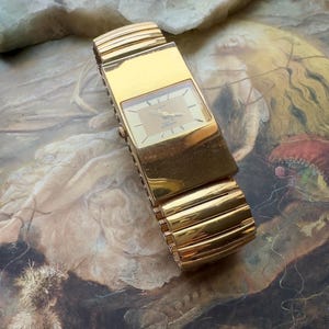 Vintage Helbros Magique Gold Tone Stretch Bracelet Watch  display picture 3