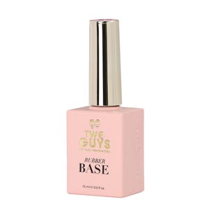 May include: A light pink nail polish bottle with a silver cap. The bottle has the text "TWO GUYS THE NAIL INNOVATORS RUBBER BASE" and "15 ml e 0.5 fl oz". The product is for nail care.