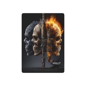 May include: A rectangular graphic print featuring two skulls separated by a vertical rifle. The left skull is dark and textured, while the right skull is engulfed in bright orange flames and smoke. The text KRGLLC appears in the bottom right corner.