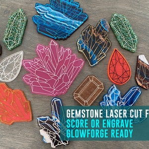 May include: A set of 10 gemstone laser cut files for Glowforge. The files are ready to be scored or engraved. The gemstones are in various colors and shapes, including red, blue, green, and brown.