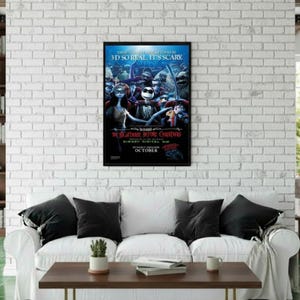 May include: A framed movie poster for "The Nightmare Before Christmas" hangs on a white brick wall. The poster features characters from the film, with text that reads "3D so real, it's scary." The poster is displayed above a white couch.