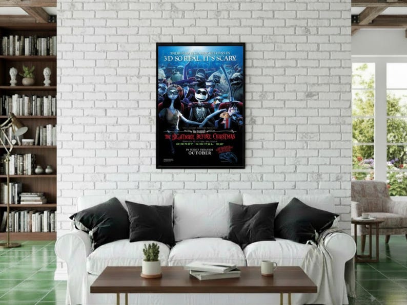 May include: A framed movie poster for "The Nightmare Before Christmas" hangs on a white brick wall. The poster features characters from the film, with text that reads "3D so real, it's scary." The poster is displayed above a white couch.
