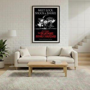May include: A framed poster featuring the text "Meet Lock, Shock & Barrel" and "The Nightmare Before Christmas" in red and white. The poster is displayed above a white sofa, with a wooden coffee table and a potted plant in the room.