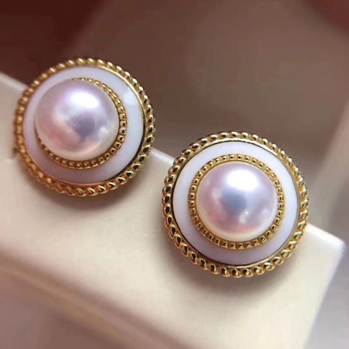 Orecchini in oro 18 carati con perle barocche bianche alla