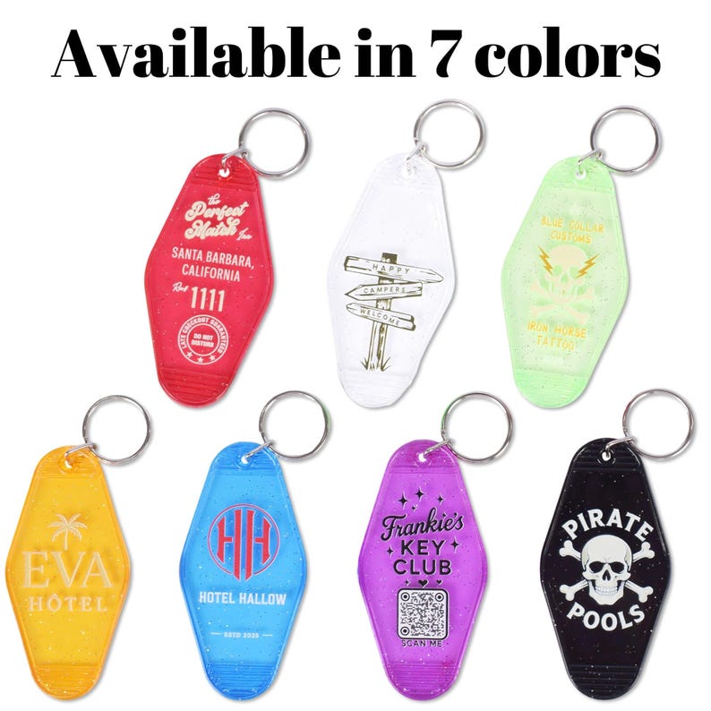 May include: Seven colorful motel-style keychains with silver key rings. Each keychain features unique designs and text, including "EVA HOTEL", "The Perfect Mater", "Frankie's Key Club", and "PIRATE POOLS". The text "Available in 7 colors" is at the top.