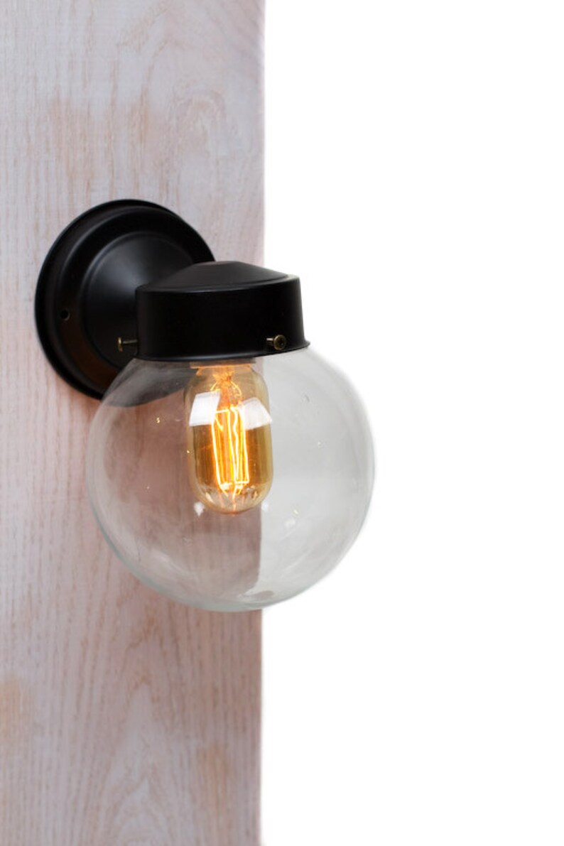 clear glass globe sconce