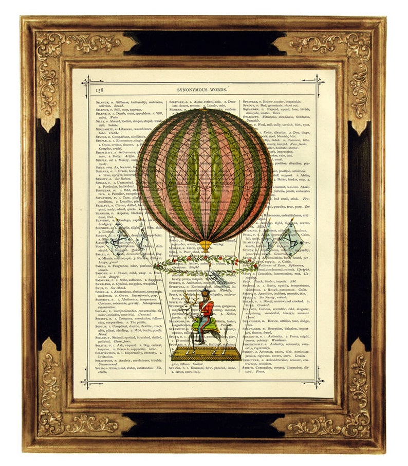 May include: A vintage illustration of a hot air balloon with a pink and green striped pattern, surrounded by a wreath of flowers and leaves. The balloon is being held aloft by two figures, one in a red uniform and the other in a blue uniform. The illustration is set against a background of a page from a dictionary with the word "SYNONYMOUS WORDS" at the top.