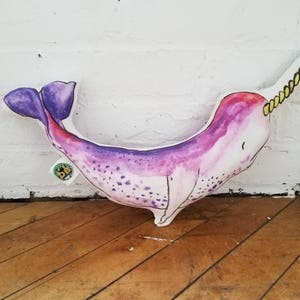 Narwhal throw pillow, stuffed animal