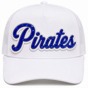May include: A white trucker hat featuring a prominent script-style applique on the front panel. The word Pirates is embroidered in bright blue sequins with a thick white border, creating a raised, textured effect against the solid white fabric.