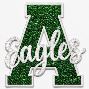 May include: A large, block-style letter A patch covered in shimmering green sequins with a white stitched border. Overlaid on the letter is the word Eagles written in white cursive script, also embellished with white sequins and a white border.