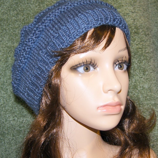 Dusty blue knit slightly slouchy hat. Very soft and fun to wear