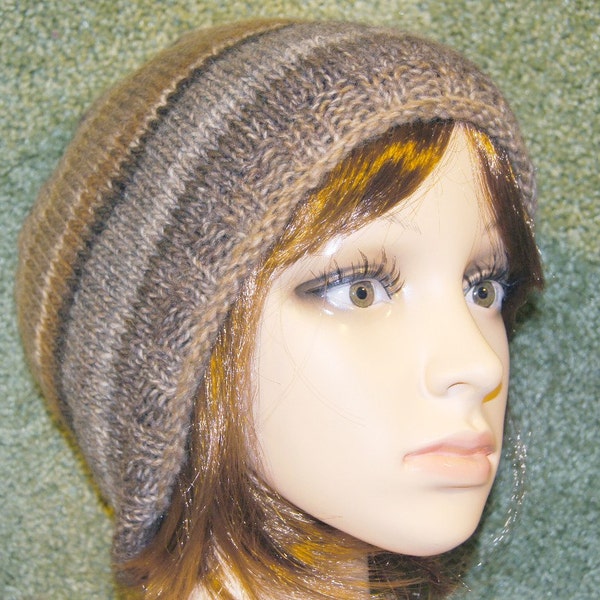 Really pretty knit wool hat in shades of brown and gray. Very soft and fun to wear