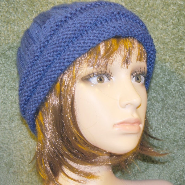 Really pretty blue knit wool and acrylic hat . Very soft and fun to wear. Unisex