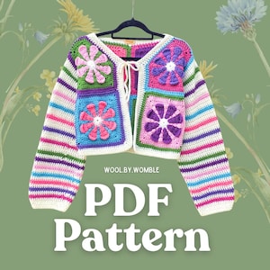 May include: A crochet cardigan featuring a front panel of multi-coloured floral granny squares and long sleeves with horizontal stripes in pink, purple, green, and blue. The garment has a tie-front closure and includes the text WOOL.BY.WOMBLE PDF Pattern.