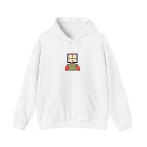 Puede incluir: Una sudadera con capucha blanca que presenta un gráfico central de un marco de ventana azul oscuro sobre una olla verde. Dos guantes de cocina rojos sostienen la olla, que contiene tres malvaviscos blancos pequeños.