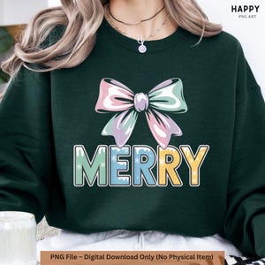 May include: Dark green sweatshirt featuring a pastel-colored bow and the word "MERRY" in a colorful, outlined font. The design includes snowflakes. The text "HAPPY PNG ART" is in the upper right corner. The bottom of the image reads "PNG File - Digital Download Only (No Physical Item)".