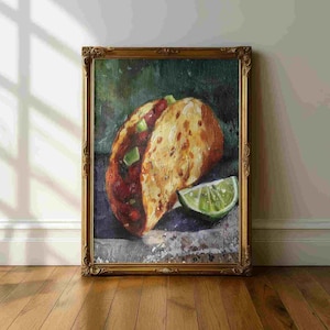 May include: An oil painting of a taco with a lime wedge, set in a gold ornate frame. The taco is filled with red ingredients and topped with green diced avocado. The taco shell is golden brown.